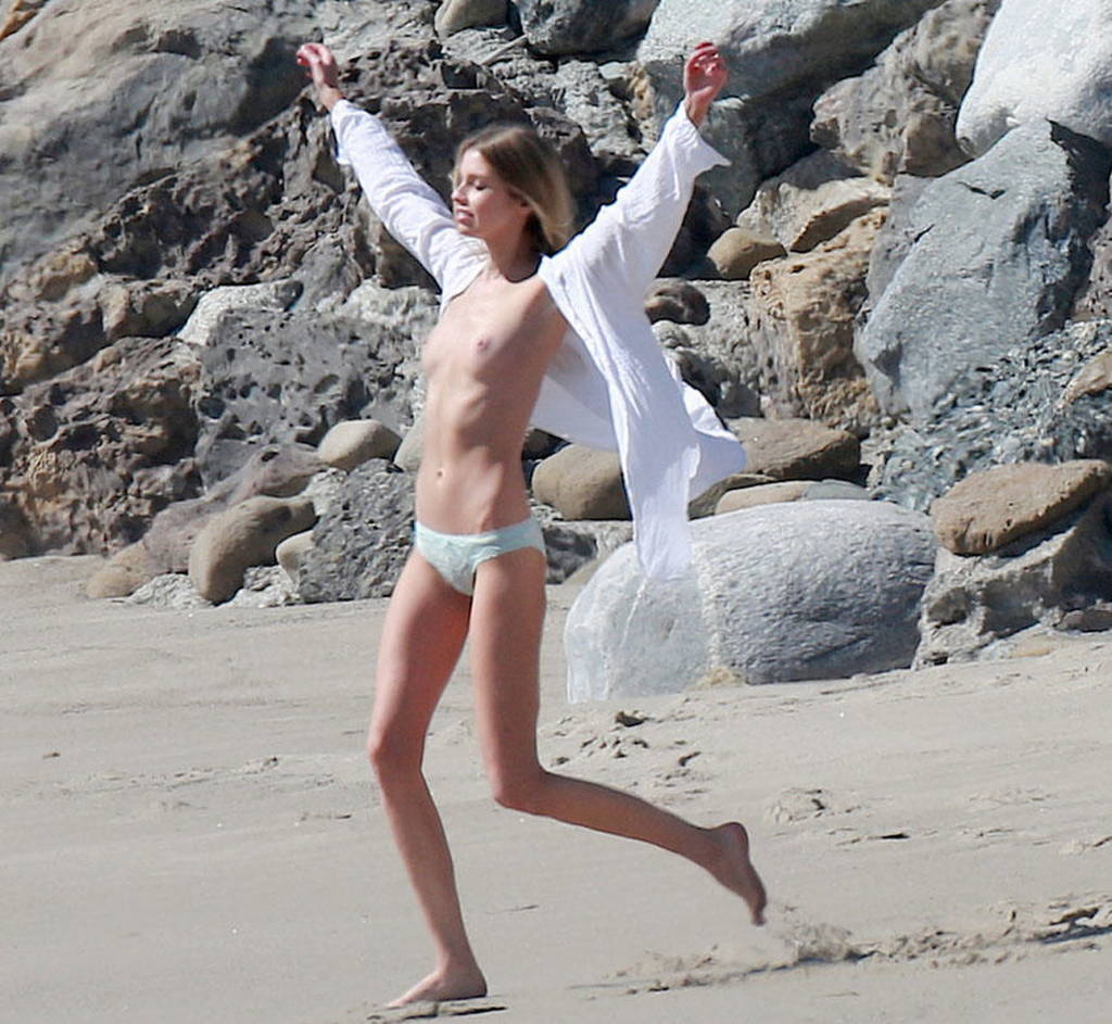 stella maxwell with naked tits running on beach