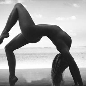 Genevieve Morton stretching at the beach