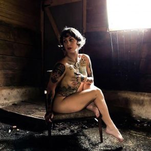 Danielle Colby sitting naked